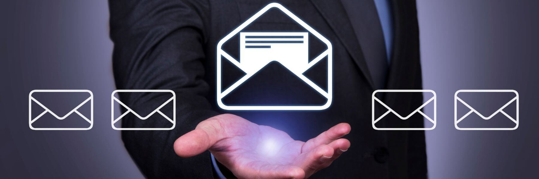 hand facing up, email concept icons above