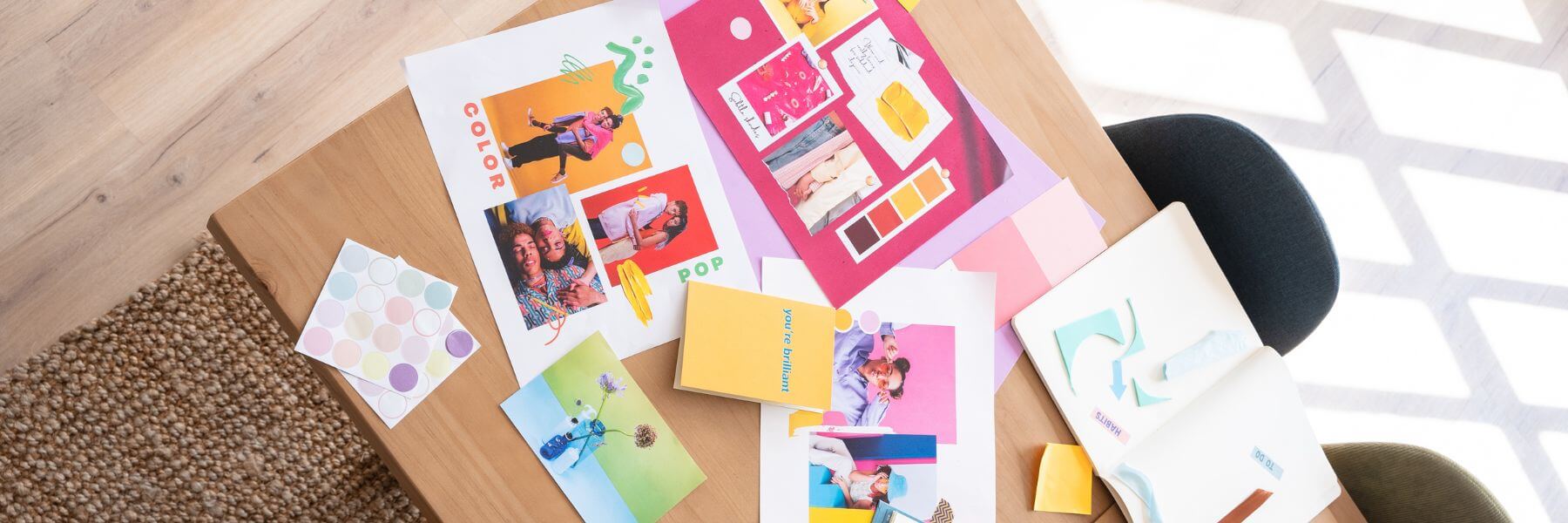 table full of colorful printed marketing materials