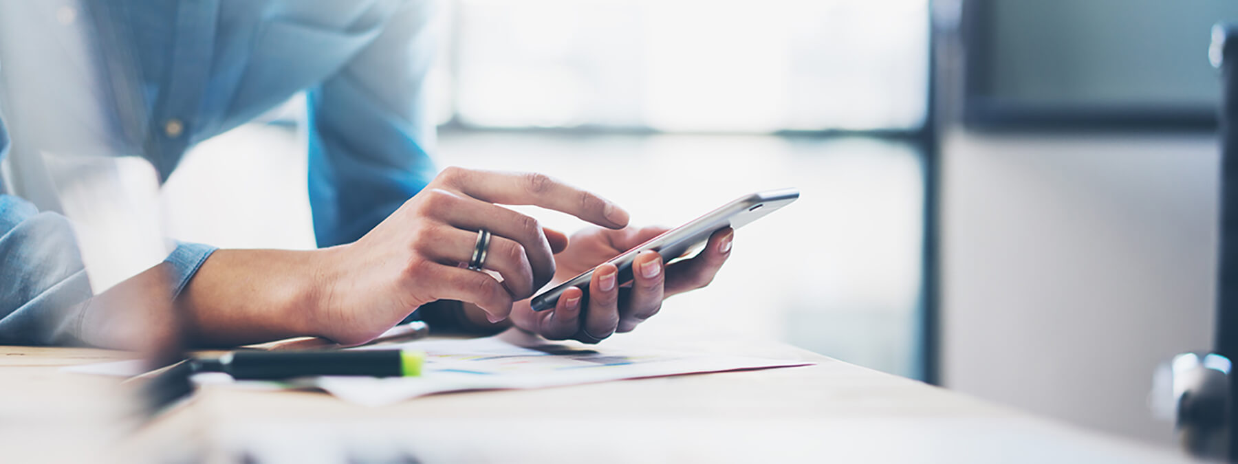 business professional using a smartphone
