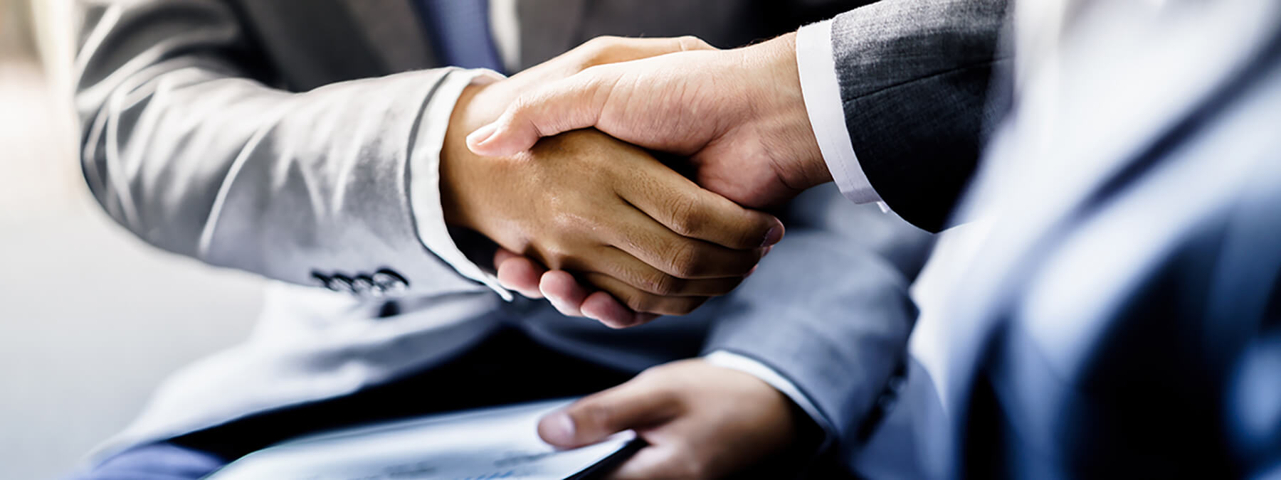 Partners shaking hands Partners shaking hands