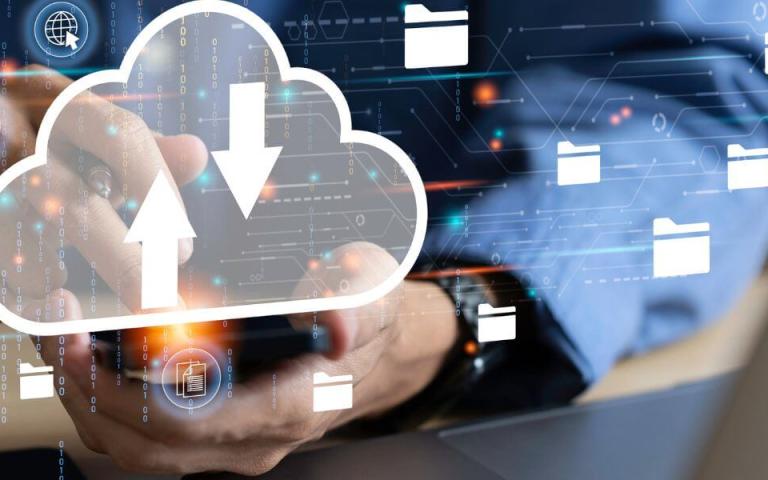 hand holding device, cloud process concept overlay with files and cloud, arrows