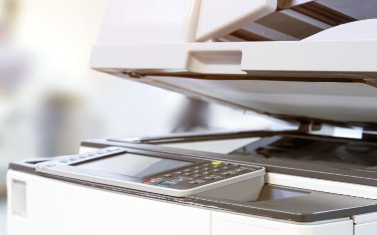 closeup of multifunction printer with open top