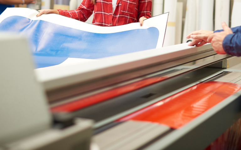 people printing large signs