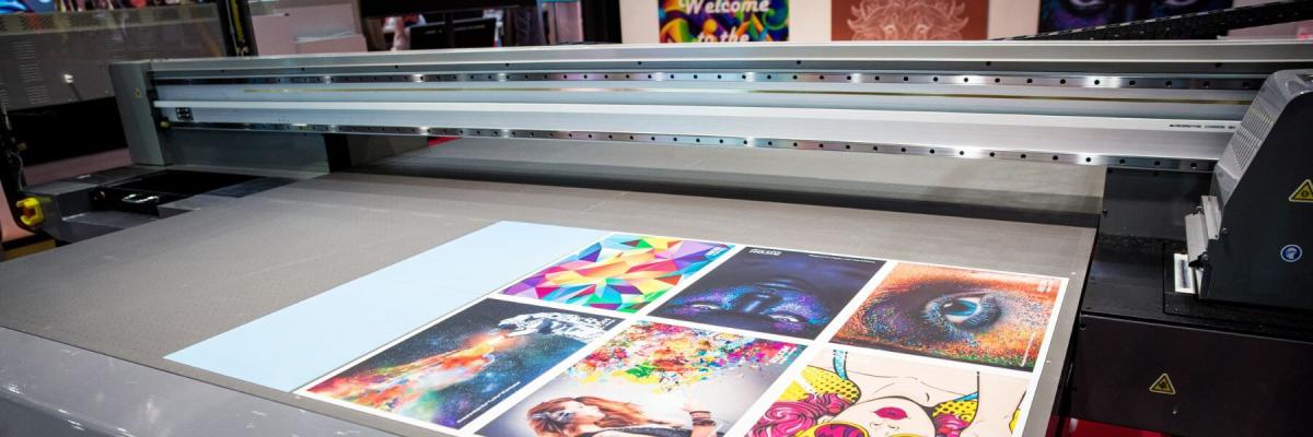 colorful prints on top of a Ricoh wide format printer